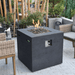 Modeno Ellington Fire Table in Liquid Propane OFG302LP Black with Flame on an Outdoor Set Up